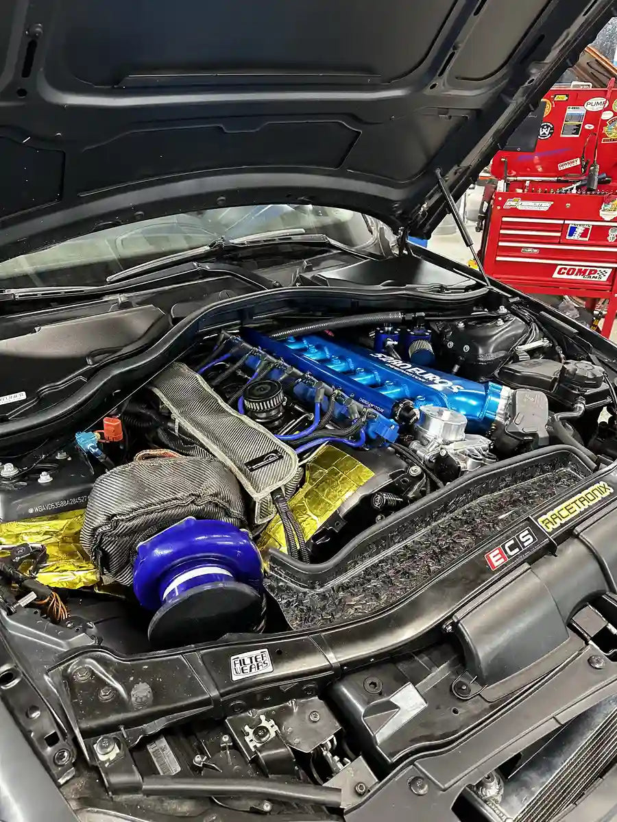 BMW N54 engine with MHD custom tune, featuring single turbo setup and ethanol compatibility, enhancing performance at SkreetTuners.